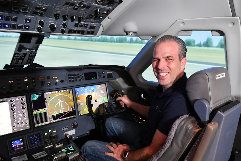 Vector Business Aviation News logo with blue and red colors.